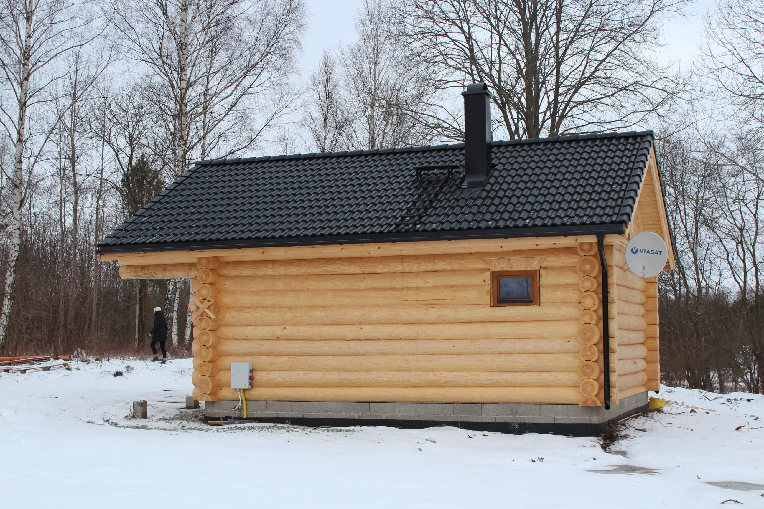 Log Sauna ready with snow