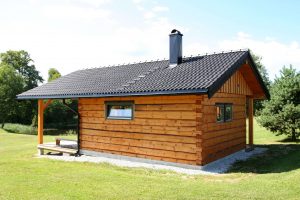 Log sauna with tiled roof